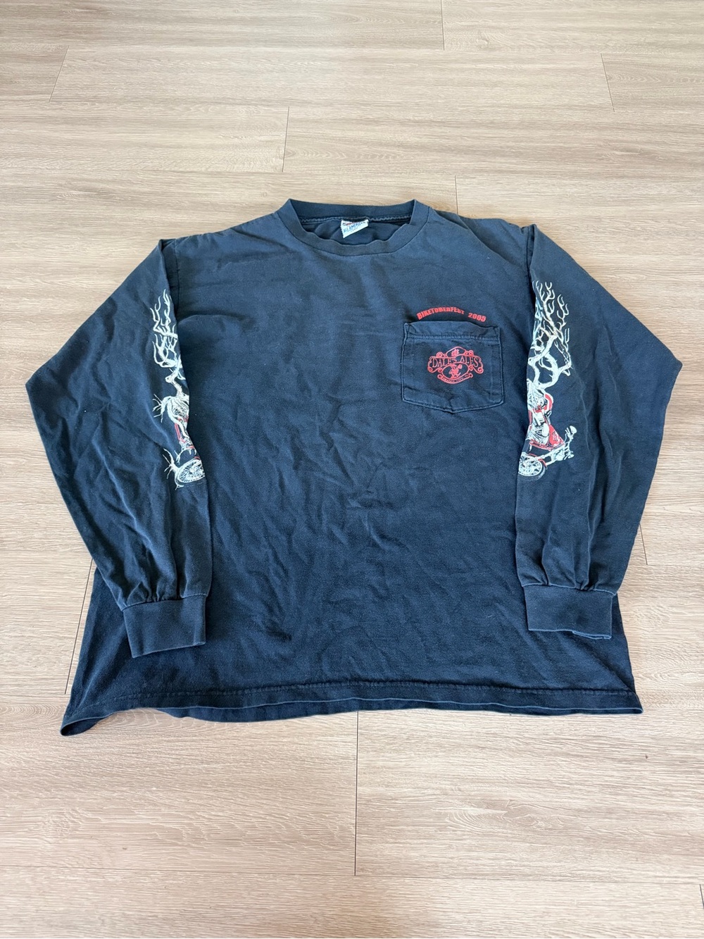 Black Long-Sleeve Graphic Pocket Tee with Sleeve Artwork